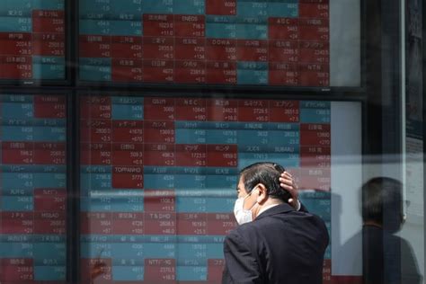 Stock market today: Asia shares mostly decline after Wall Street slide on bank worries